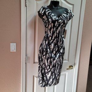 Perfect for Summer. Maggy London NWT pattern wiggle dress with ruching on sides